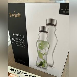 Set of 6- 18oz Fluted Portable Glass Water Bottles with Stainless Steel Lids.